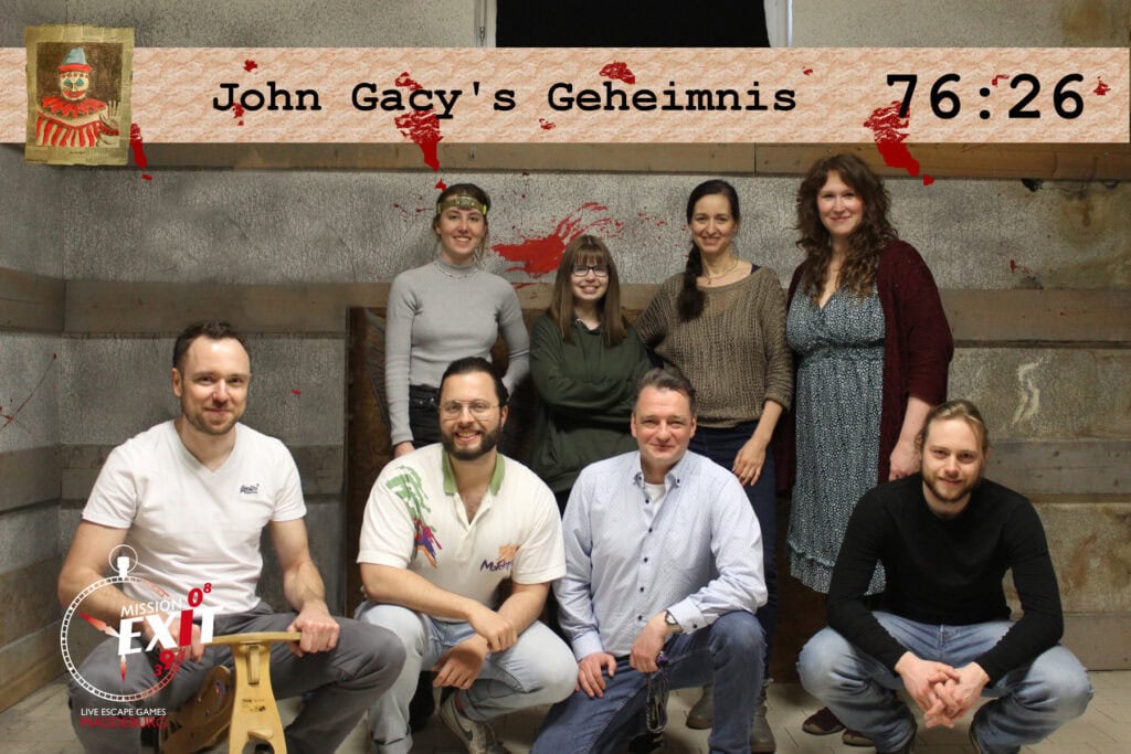 Team Event Escape Room Gruppenfoto vom HuPa-Team im Escape Room