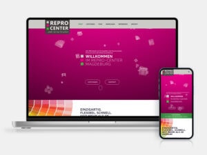 Webdesign von der Startseite für das Repro-Center Magdeburg auf Laptop und Smartphone