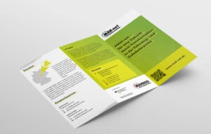 6-seitiger Flyer für MAH-net Magdeburg liegt aufgeklappt.