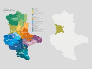 Umfangreich gestaltete Grafik von Sachsen-Anhalt mit Hervorheben der einzelnen Regionen durch unterschiedliche Farben.