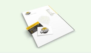 Briefbogen und zwei Visitenkarten mit jeweils Vorder- und Rückansicht im Corporate Design von Brewckau